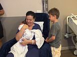 Heartwarming moment Brazilian mother-of-three holds her newborn for the first time after influencer spent eight days intubated after giving birth