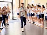 Heart-warming moment Team GB athletes form guard of honour for Andy Murray as he returns to Olympic lodgings after final match