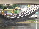 Emergency services declare ‘race against time’ to prevent major river flooding after historic bridge split in the middle and collapsed