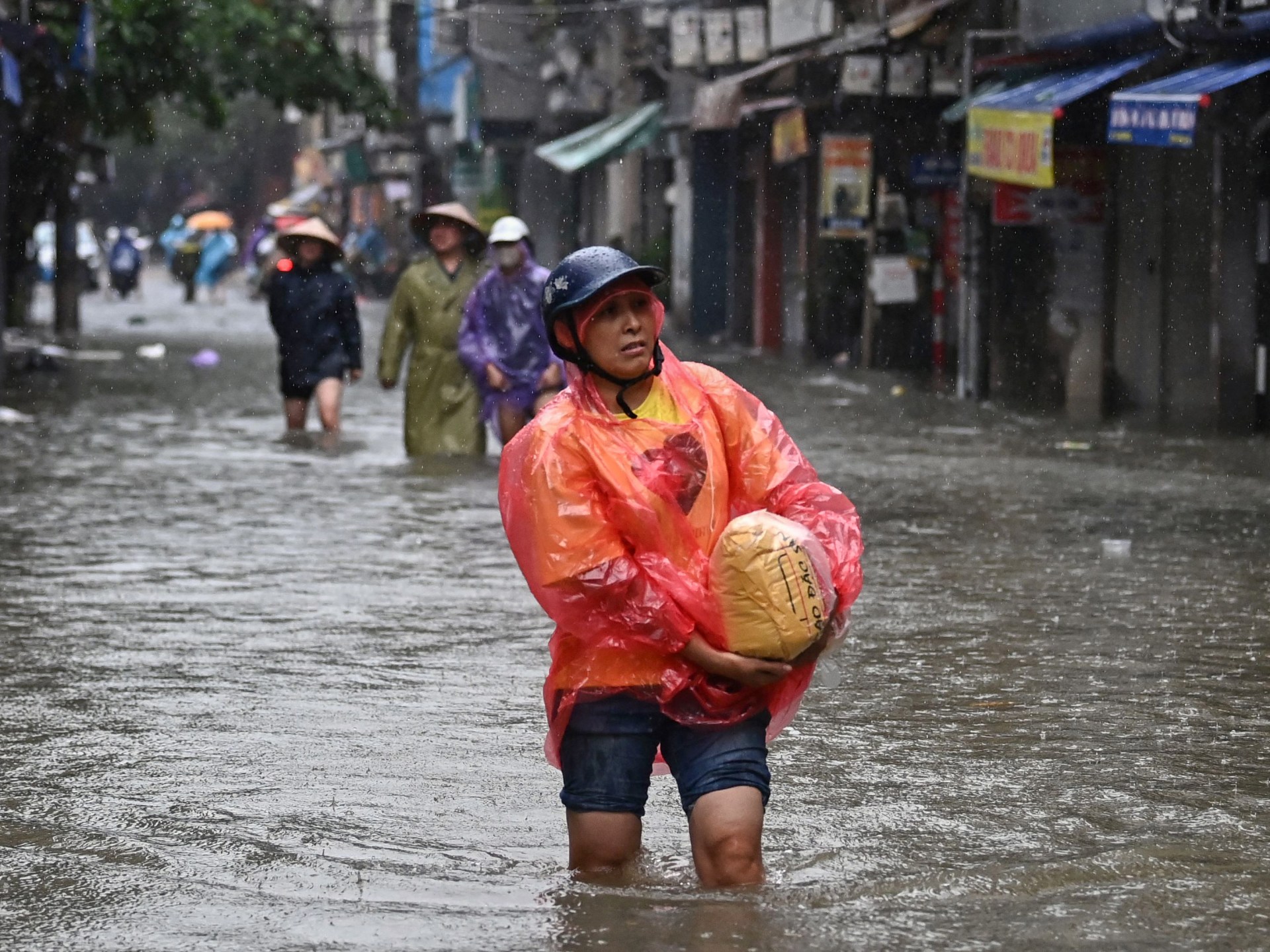 Thousands evacuated from Hanoi as Typhoon Yagi death toll climbs to 179