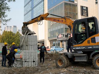 China approves $840B plan to refinance local government debt, boost slowing economy