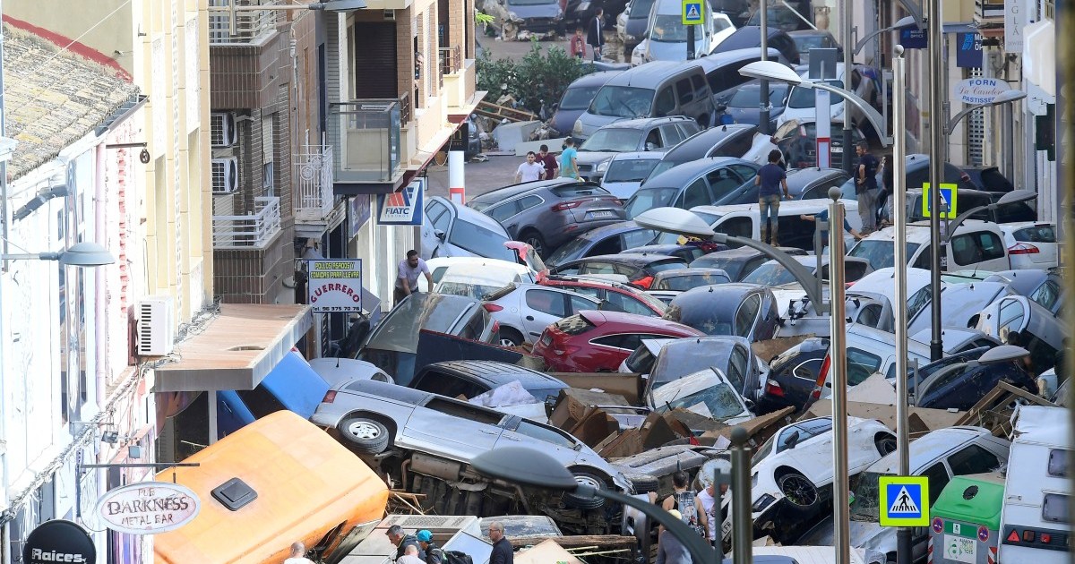 Spain races to find survivors as floods kill at least 95