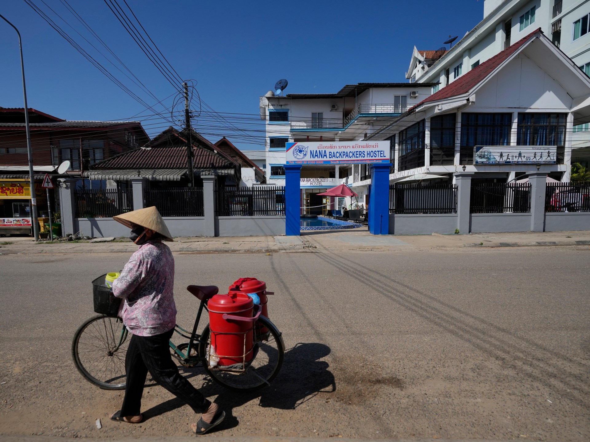 Laos pledges justice after suspected tainted alcohol kills tourists