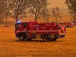 Firefighters battle to contain inferno but warn the blaze could rage out of control for WEEKS as temperatures soar