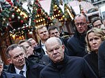 Moment German chancellor Olaf Scholz is heckled by angry mob in Magdeburg as questions remain over ‘warnings about Christmas market attack suspect’