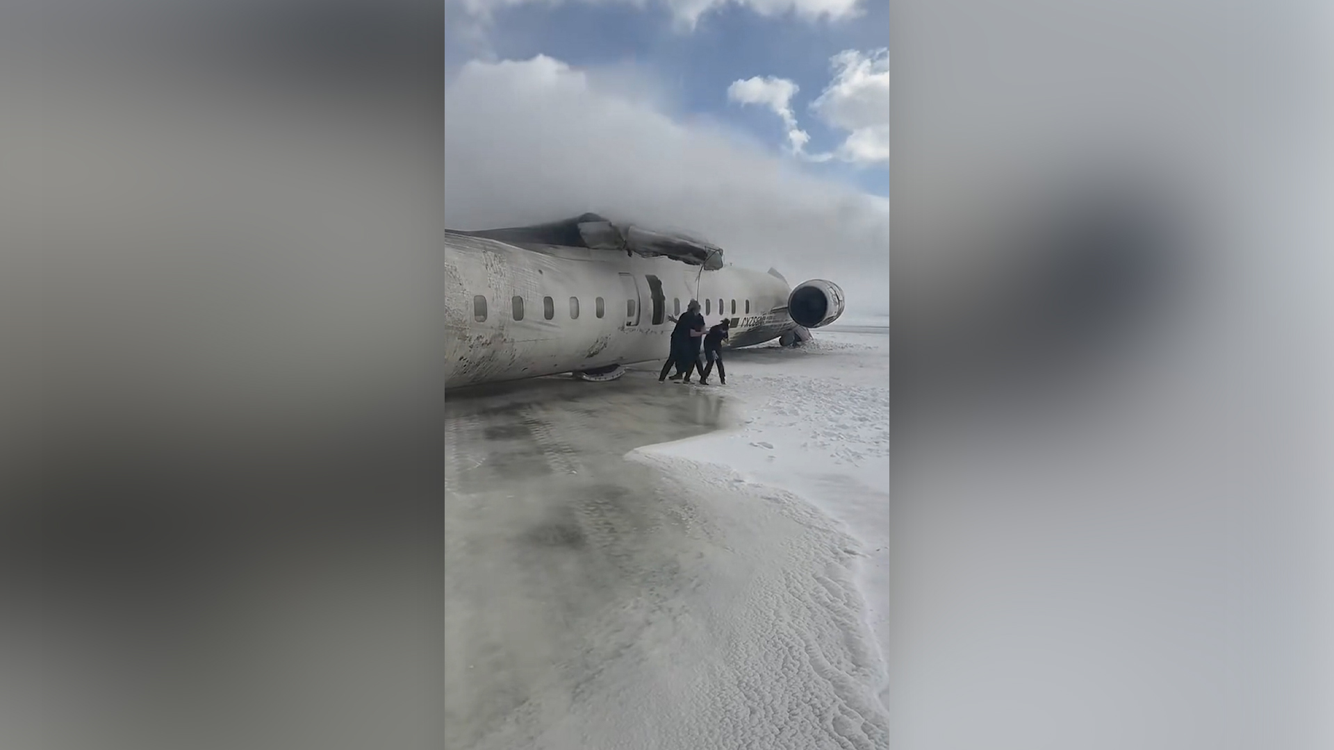 US airliner flips on back in crash landing at Toronto airport