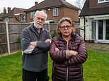 Couple holidaying in Australia watch neighbours ‘land-grab’ their garden: CCTV caught moment builders removed their fence, dug up patio, and tore down shed in bitter boundary row