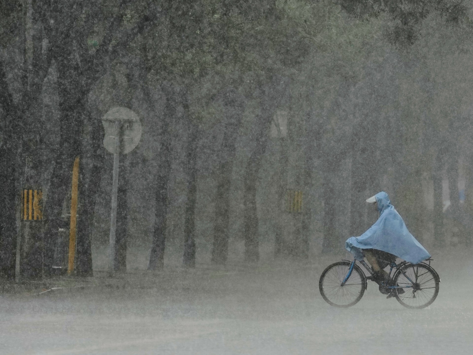 Heavy rains kill four in China as flood warnings issued in 11 provinces