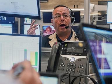 Asian shares are mixed after stocks add a bit to their records on Wall Street