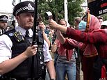 Moment pro-Palestine protester loudly bangs metal pot at Met Police officer