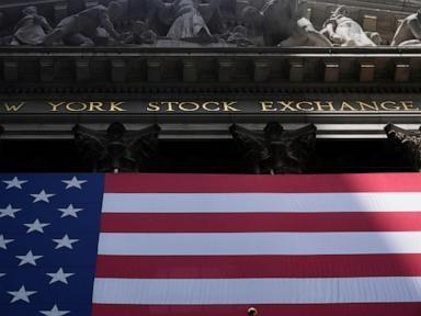 Asian shares are mixed as tech shares lead Wall Street ticks to more records