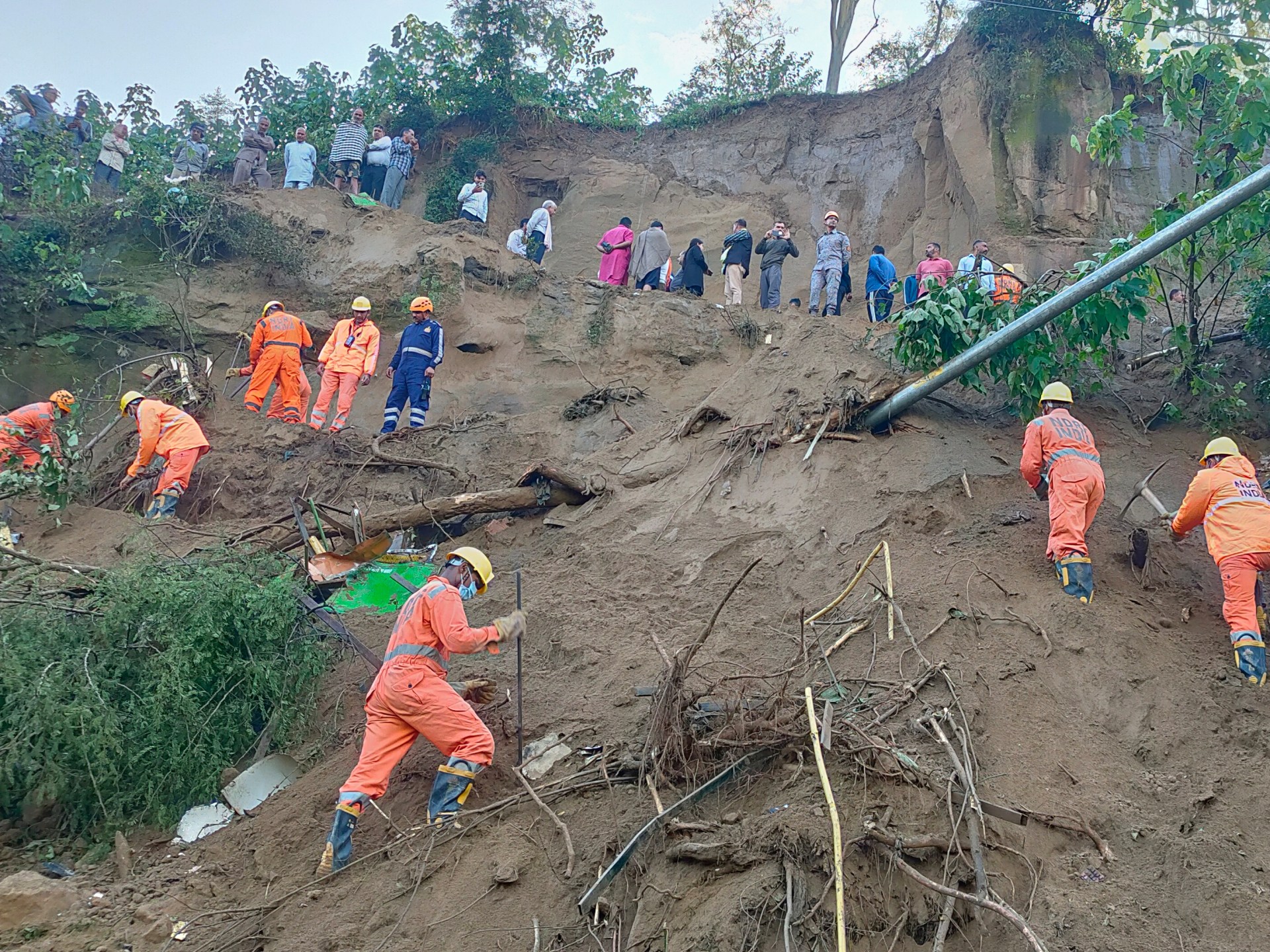 Landslide hits bus in northern India, killing 15, as rescue continues