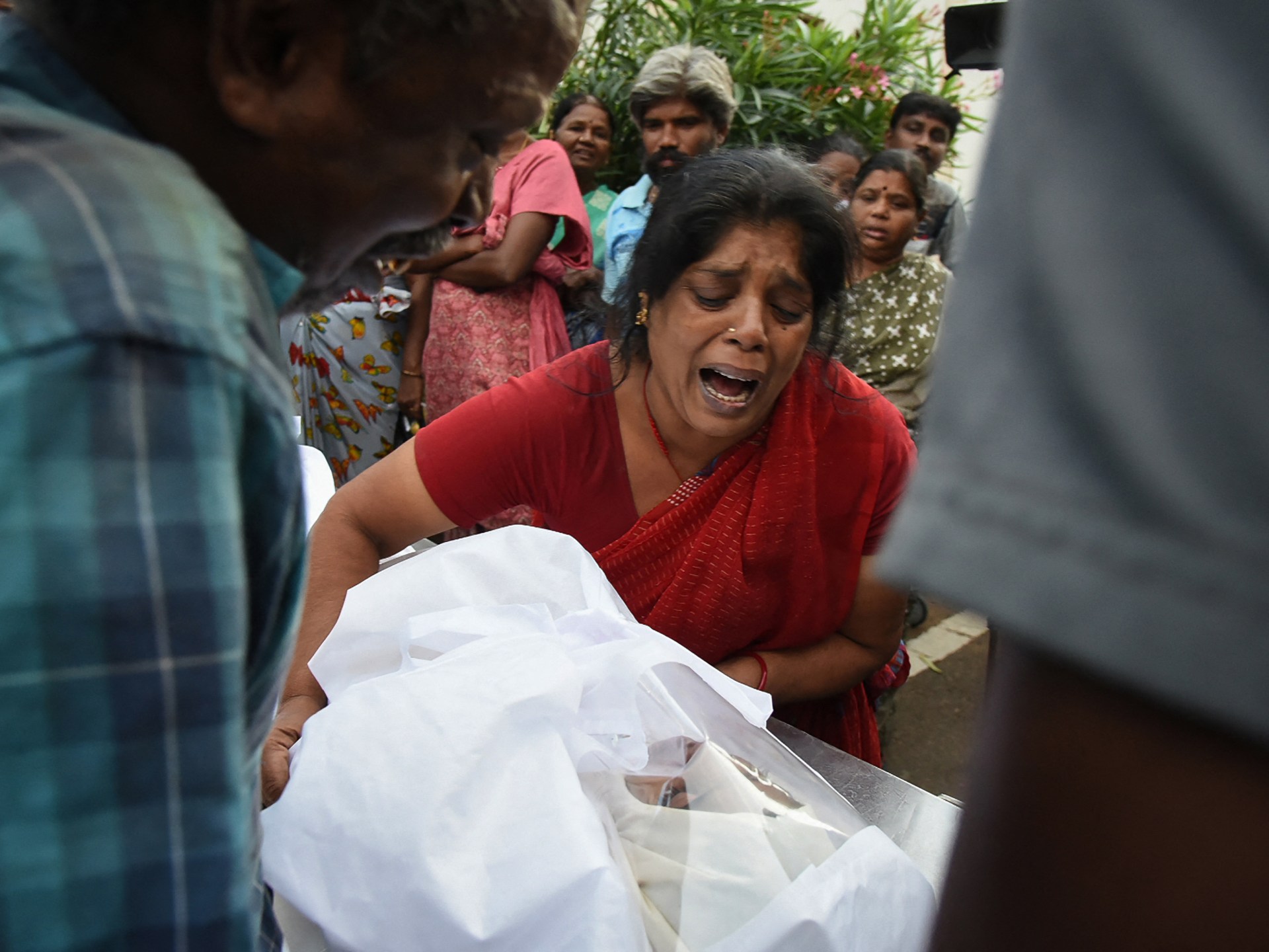 Crowd crush at political rally in southern India kills 39 people