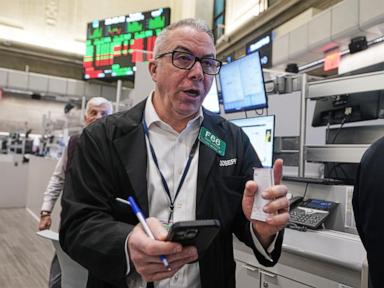 Asian shares are mixed after Wall Street inches closer to its all-time high