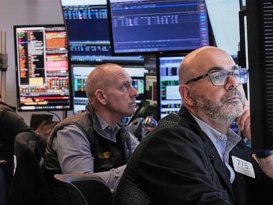 Asian shares are mixed after Wall Street pulls near its all-time high