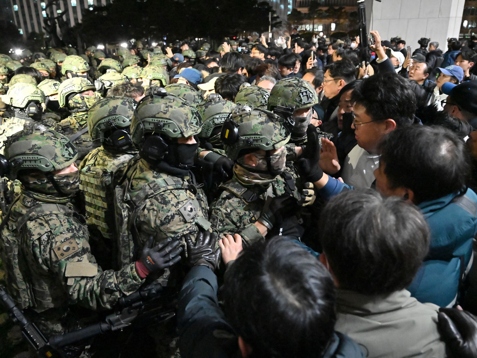 South Korea’s former PM, spy chief arrested over martial law declaration