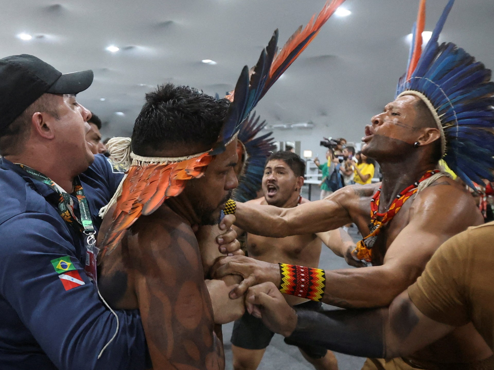 Indigenous activists storm COP30 climate summit in Brazil, demanding action