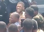 Anthony Joshua is discharged from hospital on New Year’s Eve after horror crash in Nigeria: Boxing star heads straight to funeral home to pay tribute to best friends who died in tragedy