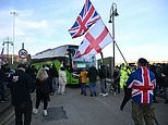 Furious protesters hammer on gates of migrant processing centre in Dover chanting ‘send them back’