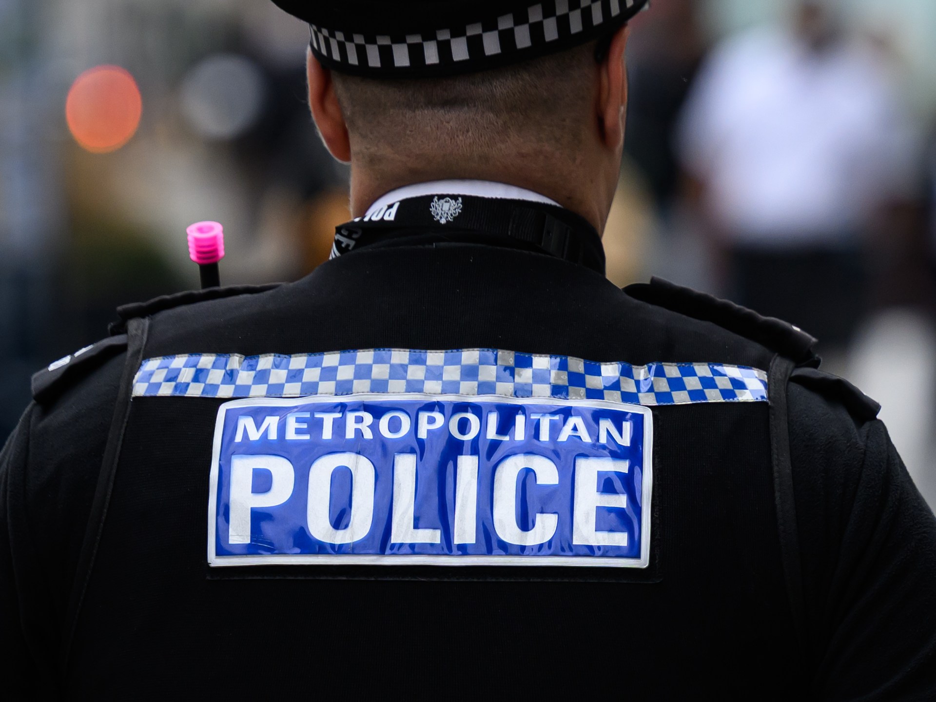 London police officer filmed in crowd intimidating Al Jazeera journalists