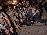 ICE agents ordered to leave after almost being overwhelmed by rabid protesters who bit chunks out of their arms amid violent clash outside NJ detention facility