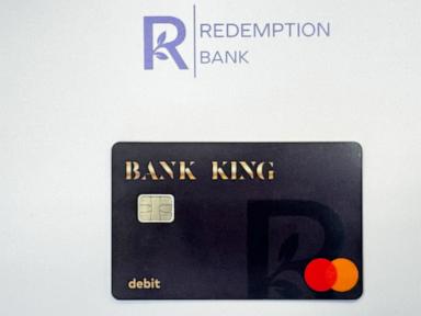Bank card program to steer cash payments to single mothers in government housing