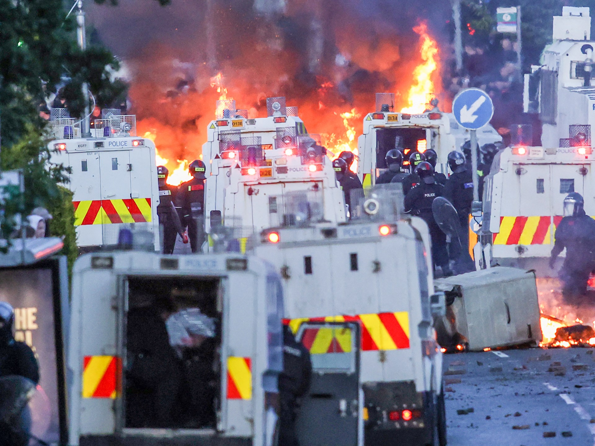 Police in Belfast use water cannon as anti-immigrant unrest continues