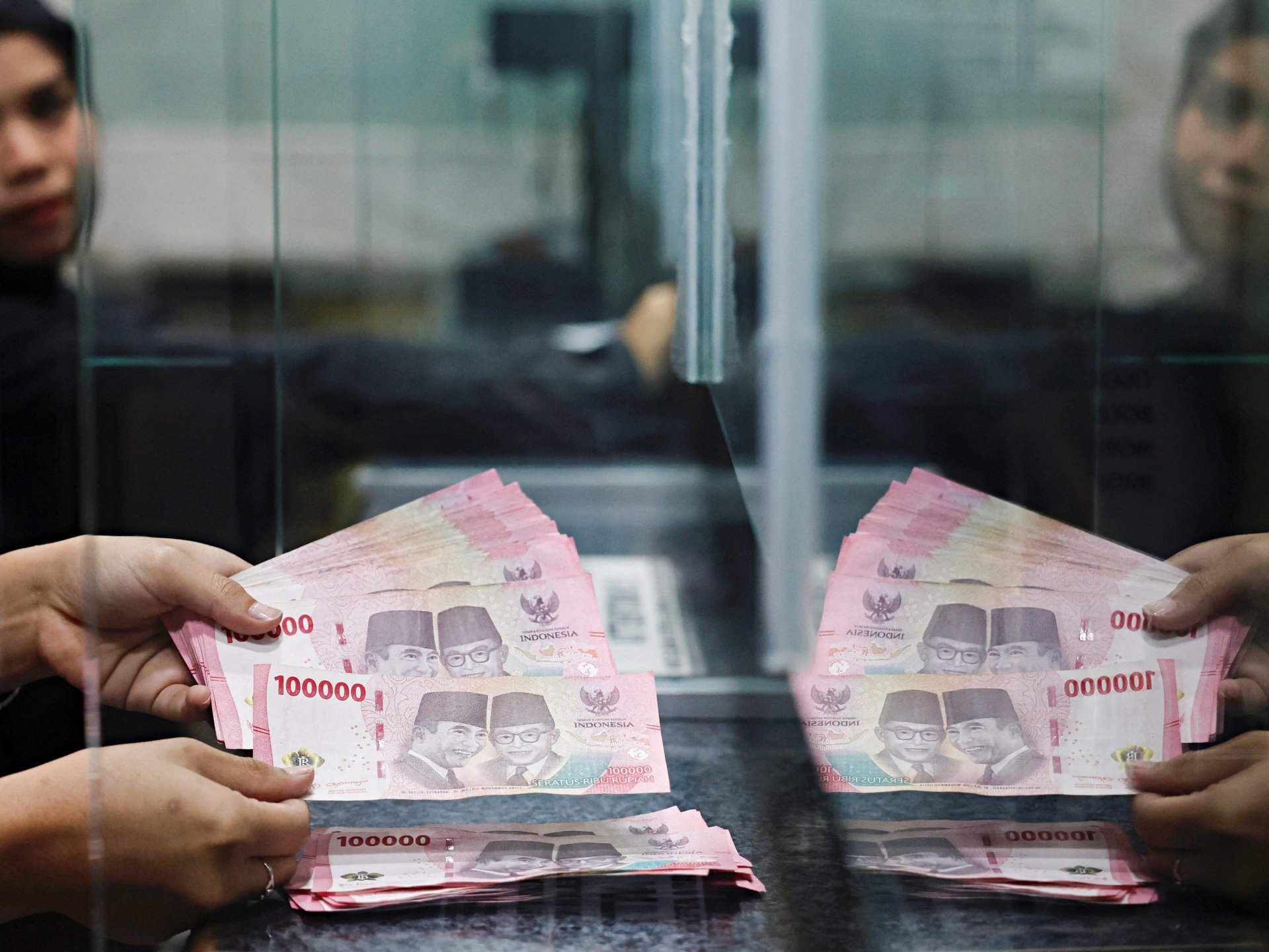 Indonesia’s rupiah falls to record low against US dollar