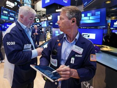 Wall Street inches to more records thanks to booming AI stocks