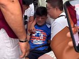Moment ‘pickpocket’ is pinned down by furious tourists who accused him of stealing a wallet at Venice’s ancient Rialto bridge